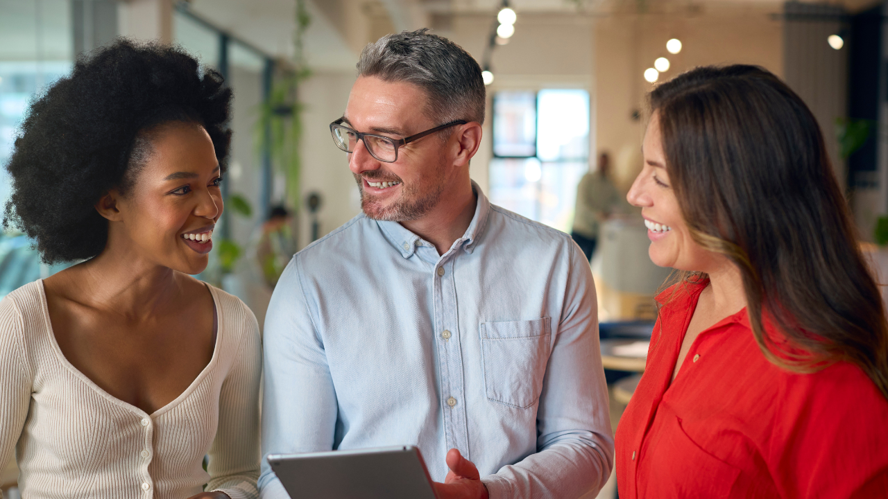 Team of professionals collaborating on big data solutions for enhanced retail insights.